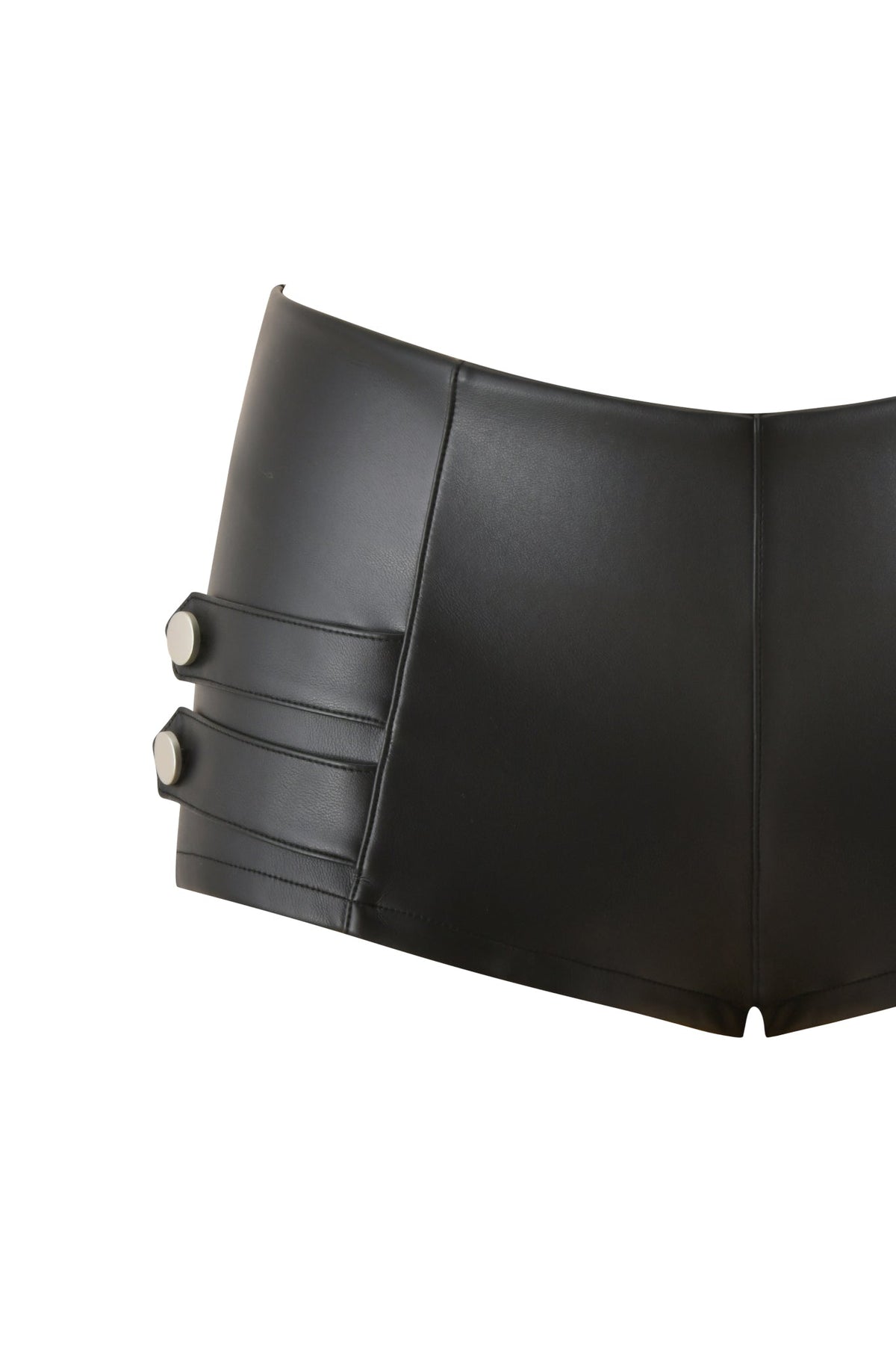 The AKASHA HARDWARE HOT SHORT - BLACK by I.AM.GIA features a daring micro mini silhouette in black faux leather, accented with two horizontal straps and button detailing on the left side. Shown against a white background, these high-waisted shorts put a bold, contemporary spin on classic faux leather style—perfect for making a statement in any edgy wardrobe.