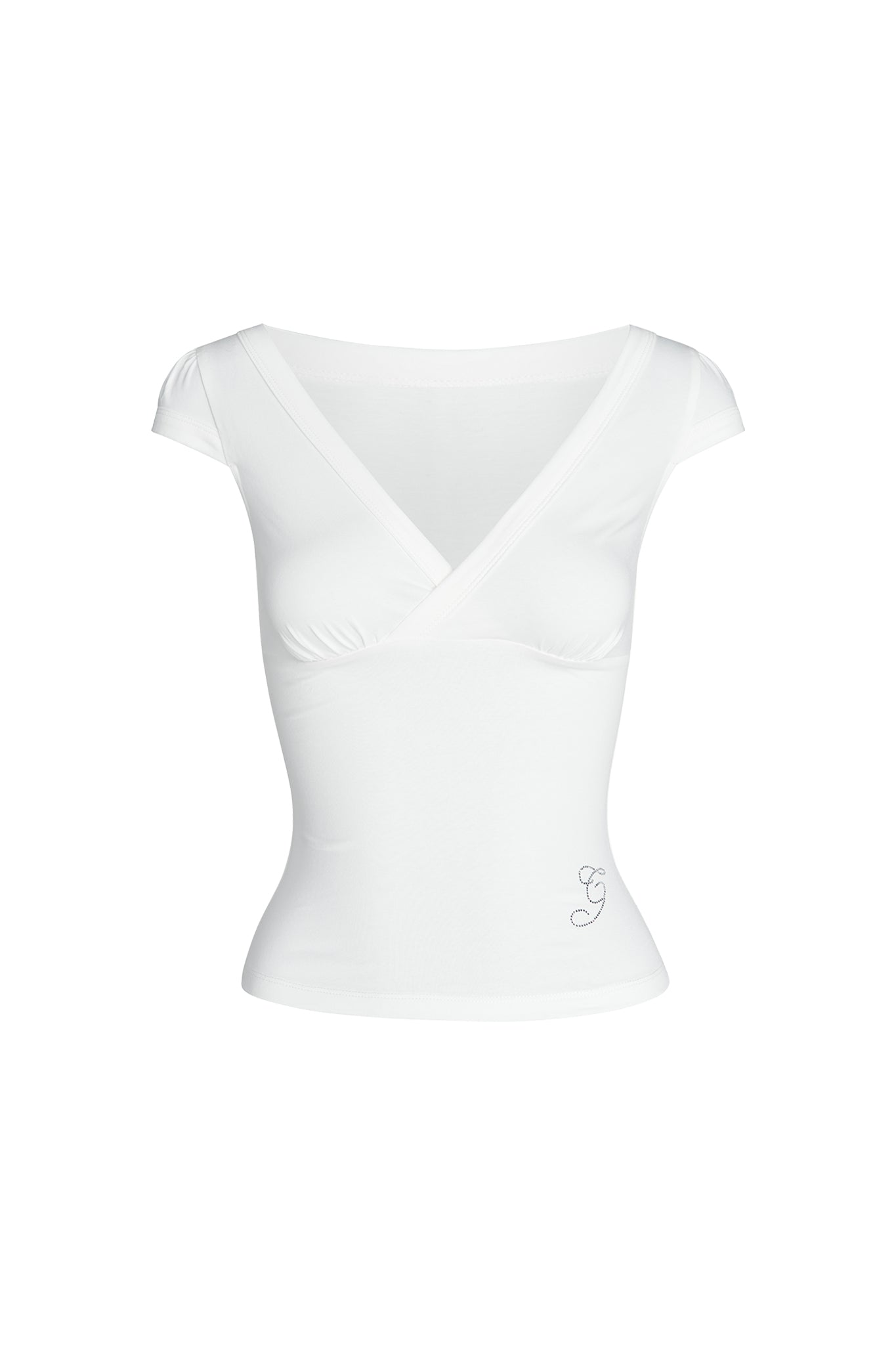 This white GIULIA TEE from I.AM.GIA is a fitted, short-sleeve women's top featuring a deep V-neck and a stylish wrap-style design. It includes slight gathering at the bust and an embroidered "G" on the lower left side. The plain white background complements its sleek look.