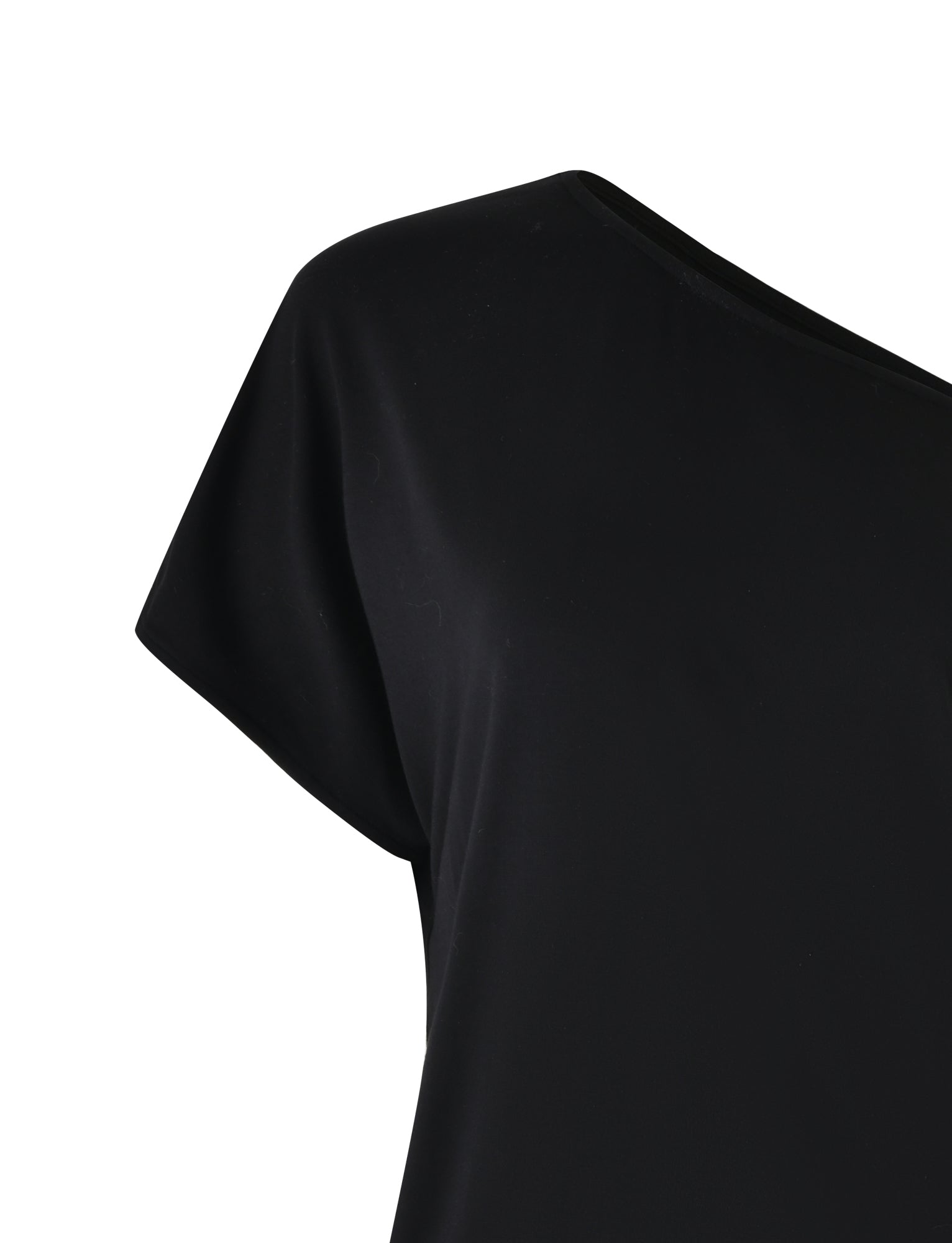 A close-up view of the black EZIA ROMPER by I.AM.GIA, featuring short sleeves and a simple, plain design with a crew neckline. The fabric looks smooth and slightly loose-fitting. The focus is on the shoulder area, with no visible patterns or logos.